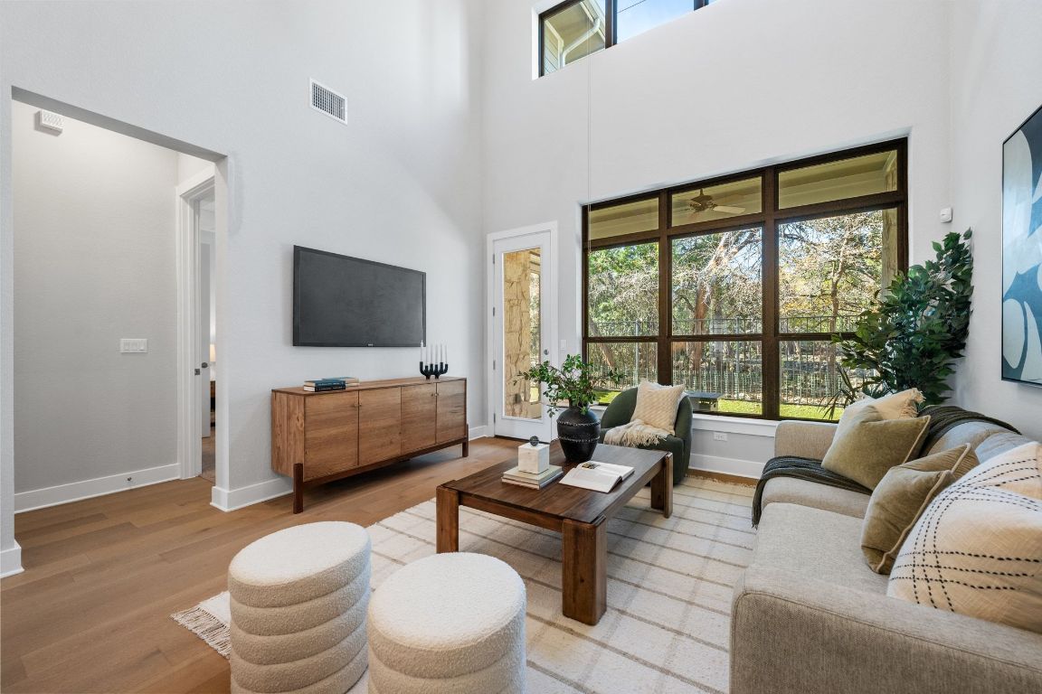 4323 Spicewood Springs Road, Unit 9 Austin, TX 78759 - Photo 11 of 31 Light-filled main living area with soaring ceilings