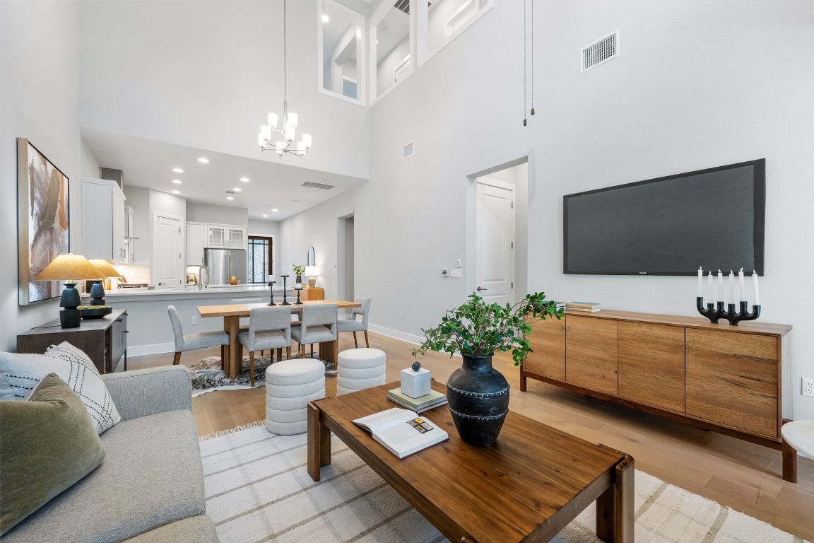 4323 Spicewood Springs Road, Unit 9 Austin, TX 78759 - Photo 13 of 31 Open living and dining designed for everyday ease