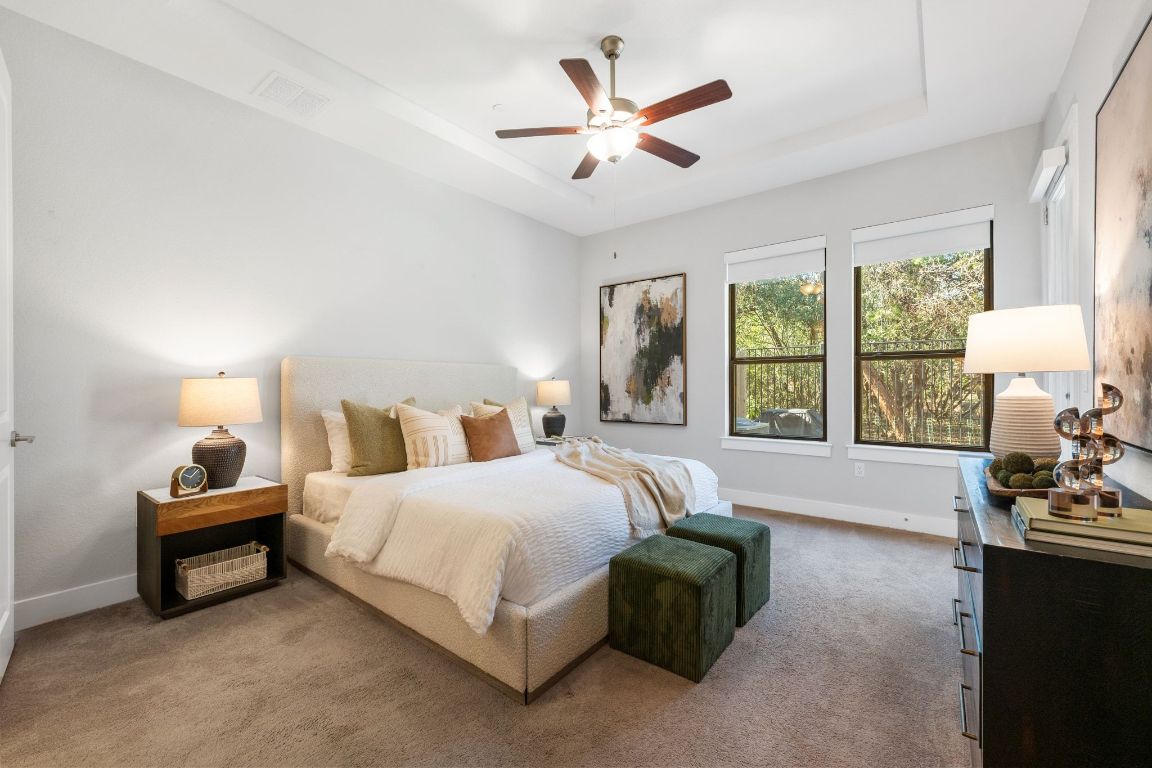 4323 Spicewood Springs Road, Unit 9 Austin, TX 78759 - Photo 15 of 31 Spacious primary bedroom with backyard views