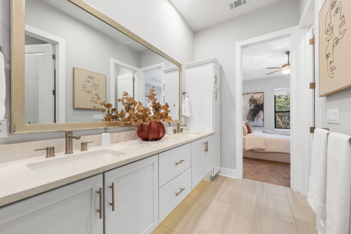 4323 Spicewood Springs Road, Unit 9 Austin, TX 78759 - Photo 19 of 31 Ensuite bathroom featuring double vanity