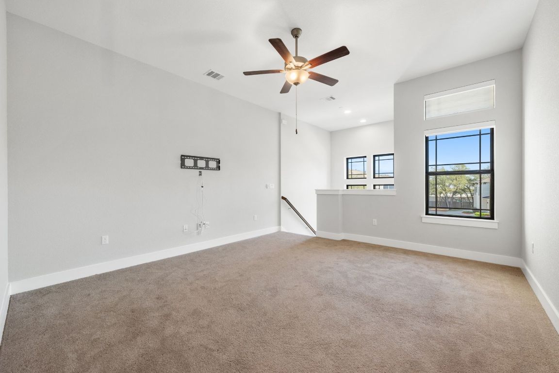 4323 Spicewood Springs Road, Unit 9 Austin, TX 78759 - Photo 23 of 31 Upstairs secondary living area with flexible use