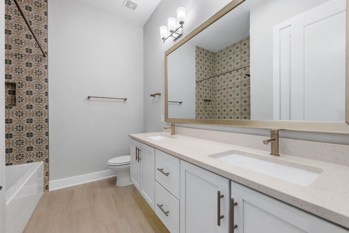 4323 Spicewood Springs Road, Unit 9 Austin, TX 78759 - Photo 26 of 31 Bathroom with double vanity