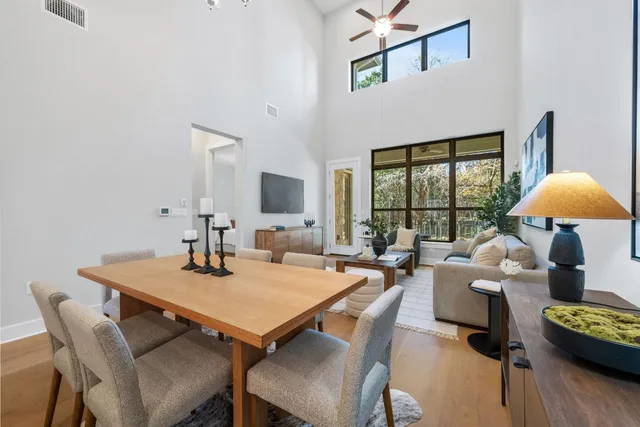 a living room with furniture and a table