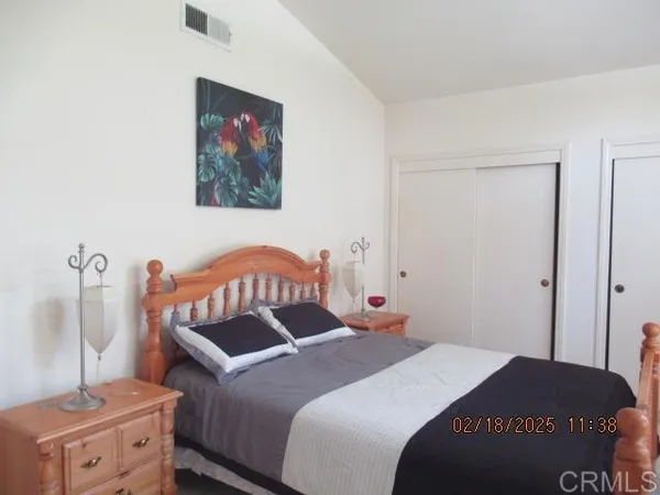 a bathroom with a sink a vanity and a window