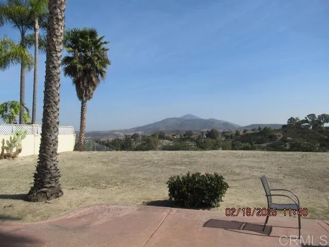 a view of a lake with mountain in the background