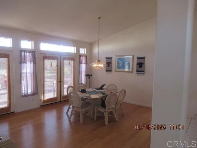 a kitchen with a table and a stove