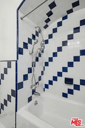 a bathroom with a sink and a shower