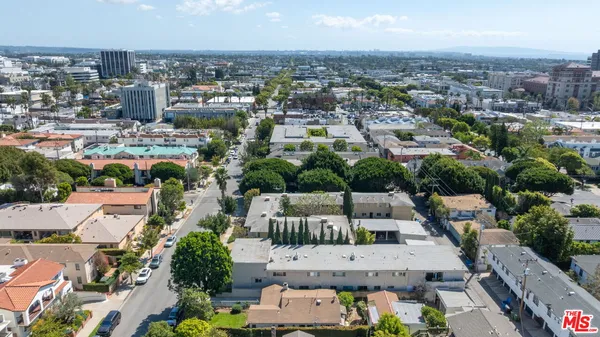 an aerial view of a city with lots of residential buildings