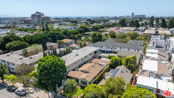 an aerial view of a city with lots of residential buildings