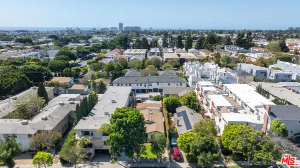 an aerial view of a city with lots of residential buildings