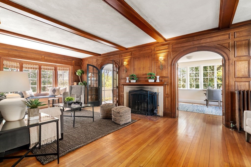 5 Hammond Street Newton, MA 02467 - Photo 12 of 40 a living room with furniture and a fireplace