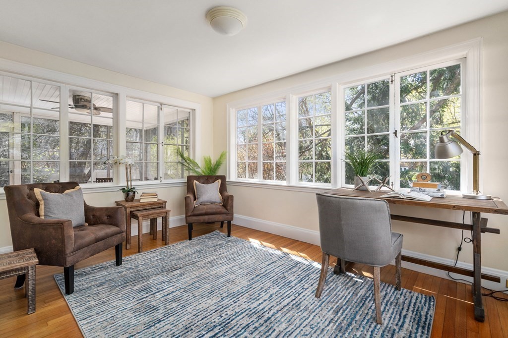 5 Hammond Street Newton, MA 02467 - Photo 16 of 40 a living room with furniture and large windows