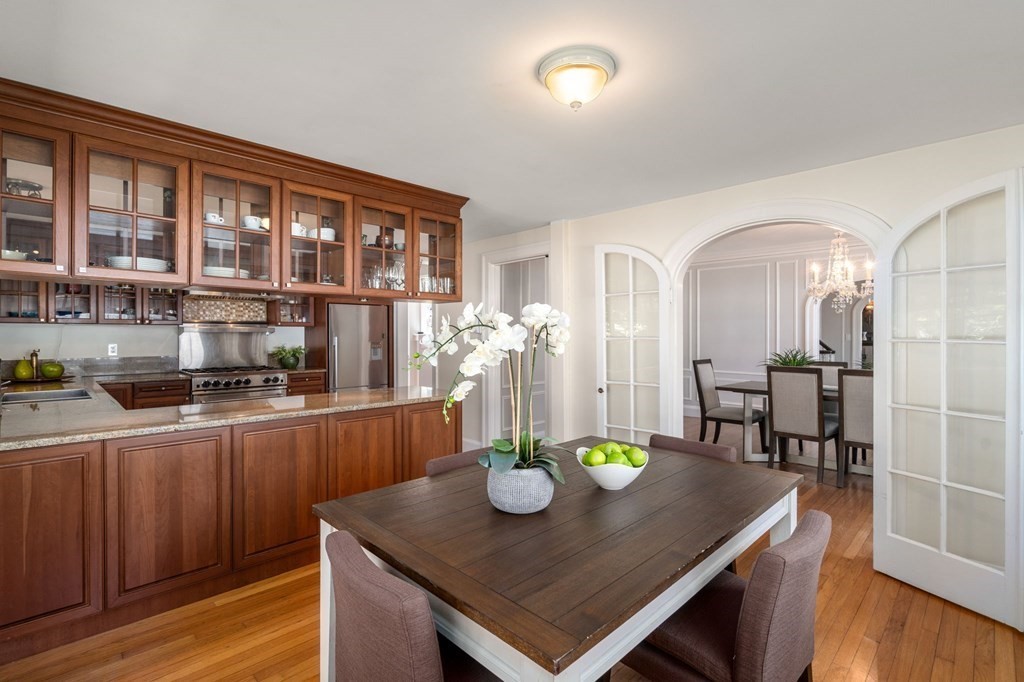 5 Hammond Street Newton, MA 02467 - Photo 23 of 40 a view of a dining room with furniture and wooden floor