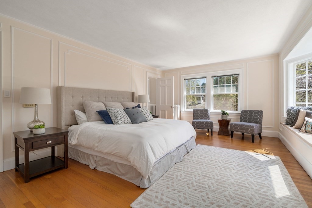 5 Hammond Street Newton, MA 02467 - Photo 27 of 40 a spacious bedroom with a bed and a couch
