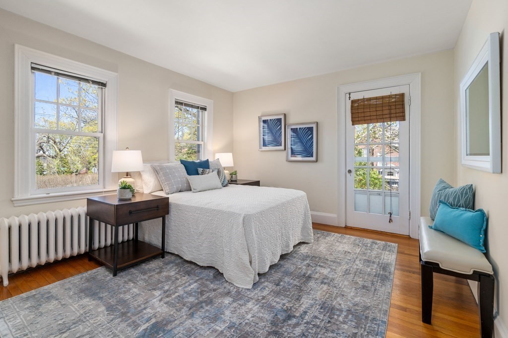 5 Hammond Street Newton, MA 02467 - Photo 32 of 40 a spacious bedroom with a bed and a window