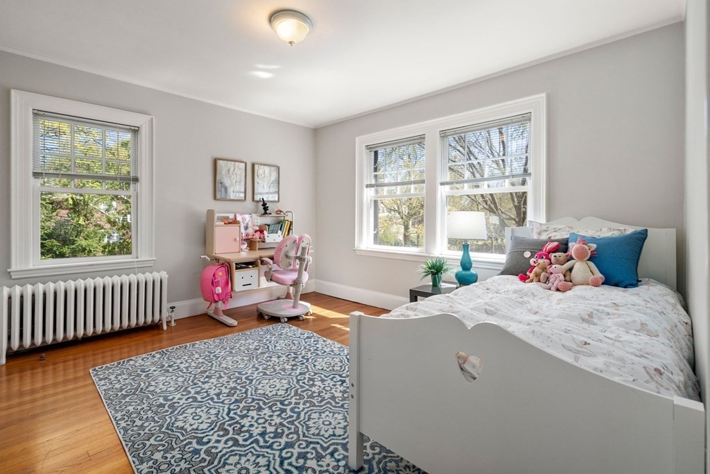 5 Hammond Street Newton, MA 02467 - Photo 34 of 40 a bedroom with furniture and a window