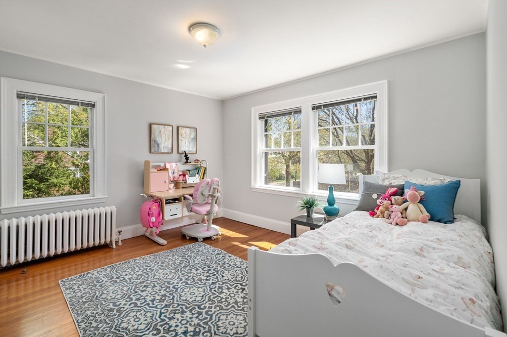 5 Hammond Street Newton, MA 02467 - Photo 35 of 40 a bedroom with a bed and a window