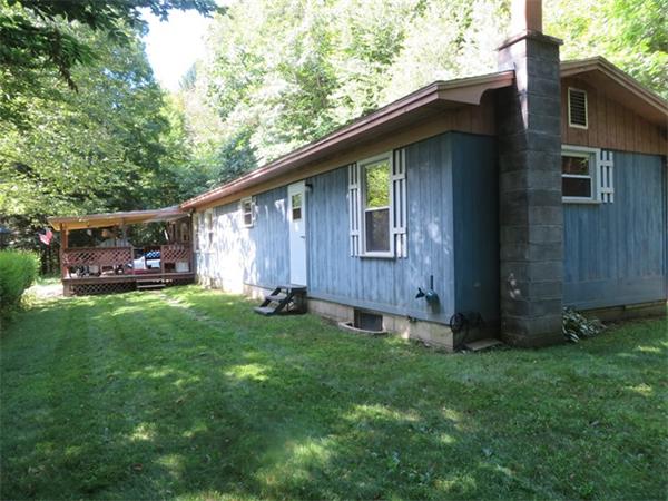 100 Green River Road Colrain, MA 01340 - Photo 2 of 17 a backyard of a house with lots of green space