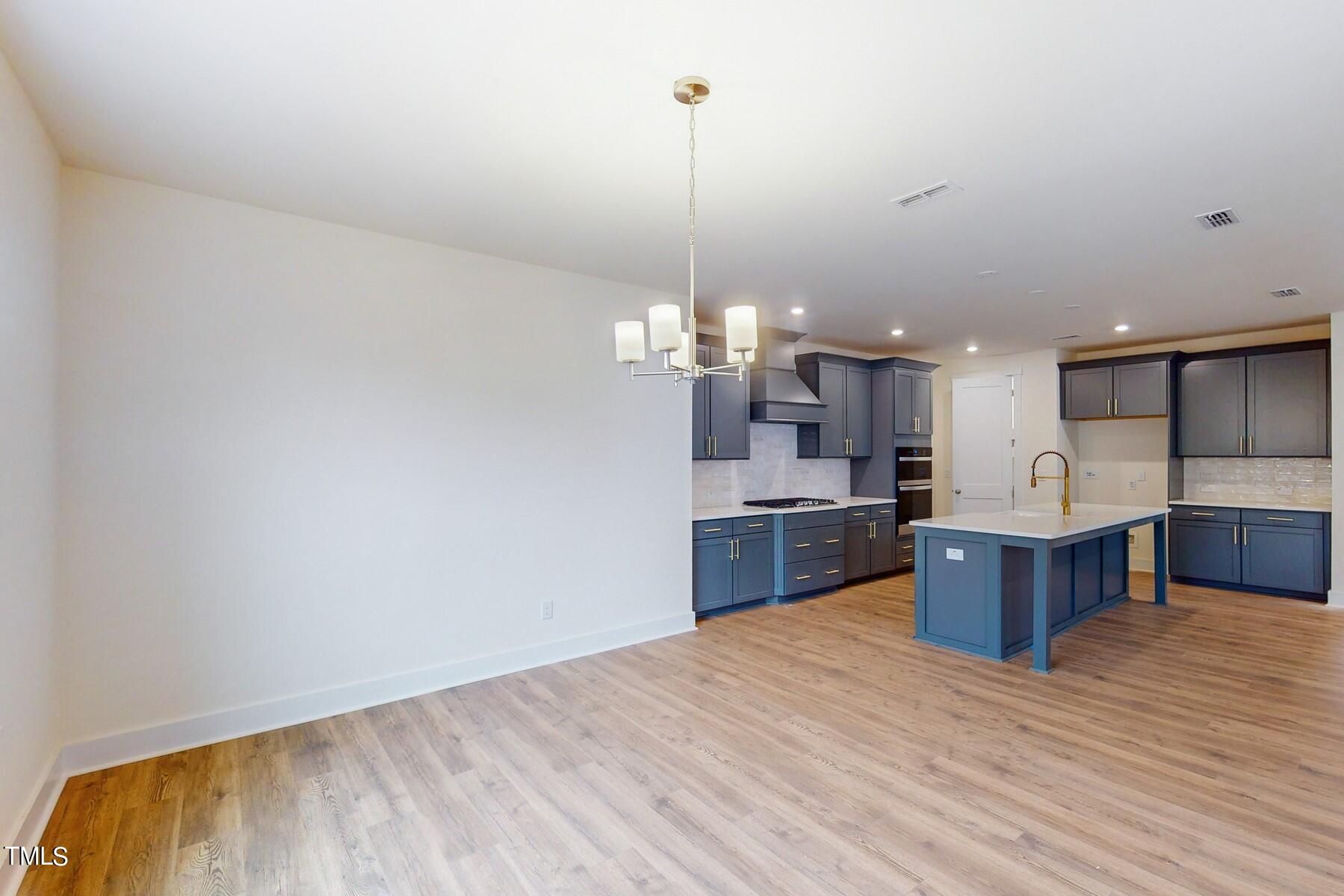 2104 Limestone Way Durham, NC 27705 - Photo 10 of 28 29-dining and kitchen