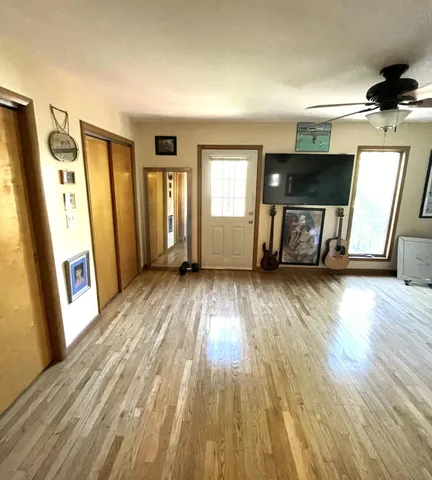 a living room with furniture and a table