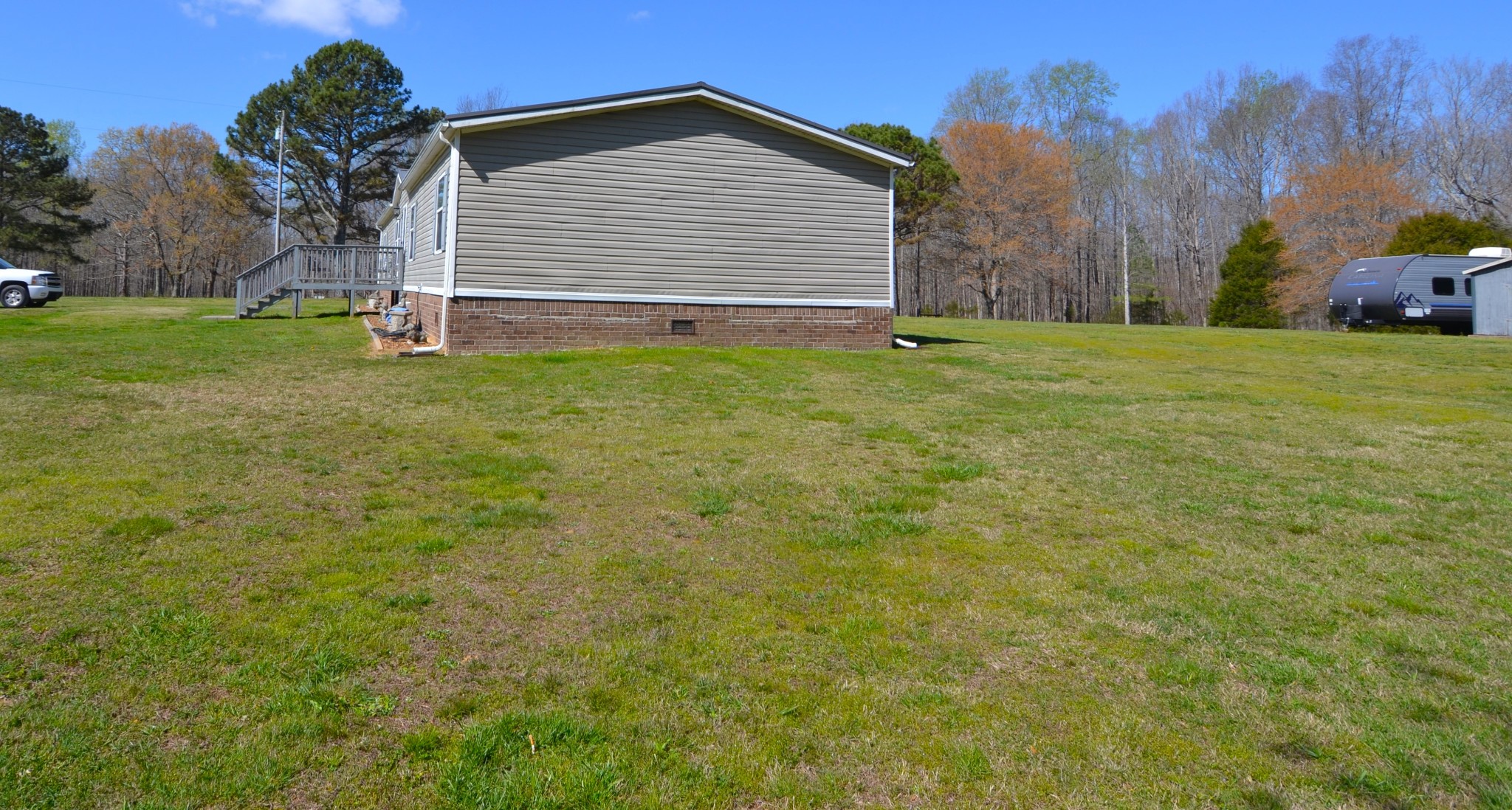 1432 Fall River Road Goodspring, TN 38460 - Photo 8 of 35 a backyard of a house with lots of green space