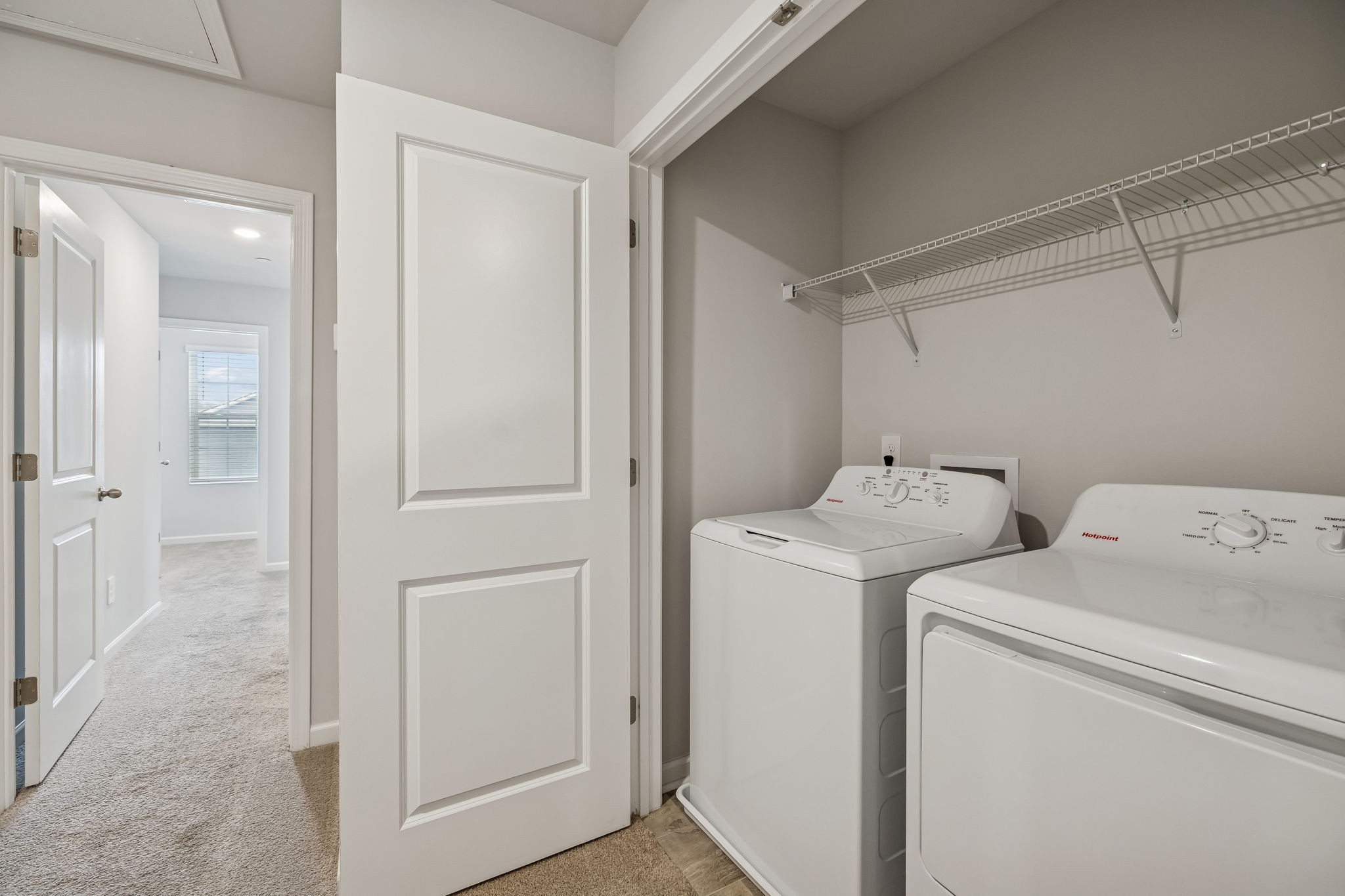 174 Mackenzie Way Lewisburg, TN 37091 - Photo 27 of 32 a view of storage and utility room with washer and dryer
