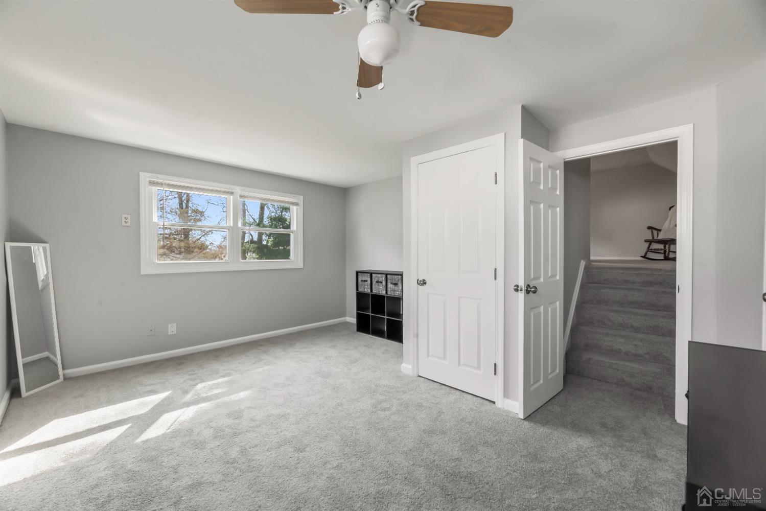 36 Shetland Road East Brunswick, NJ 08816 - Photo 11 of 22 an empty room with windows and cabinet