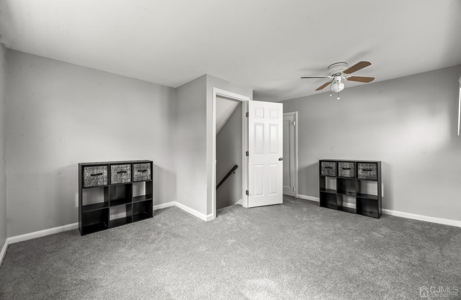 36 Shetland Road East Brunswick, NJ 08816 - Photo 12 of 22 an empty room with a ceiling fan and window
