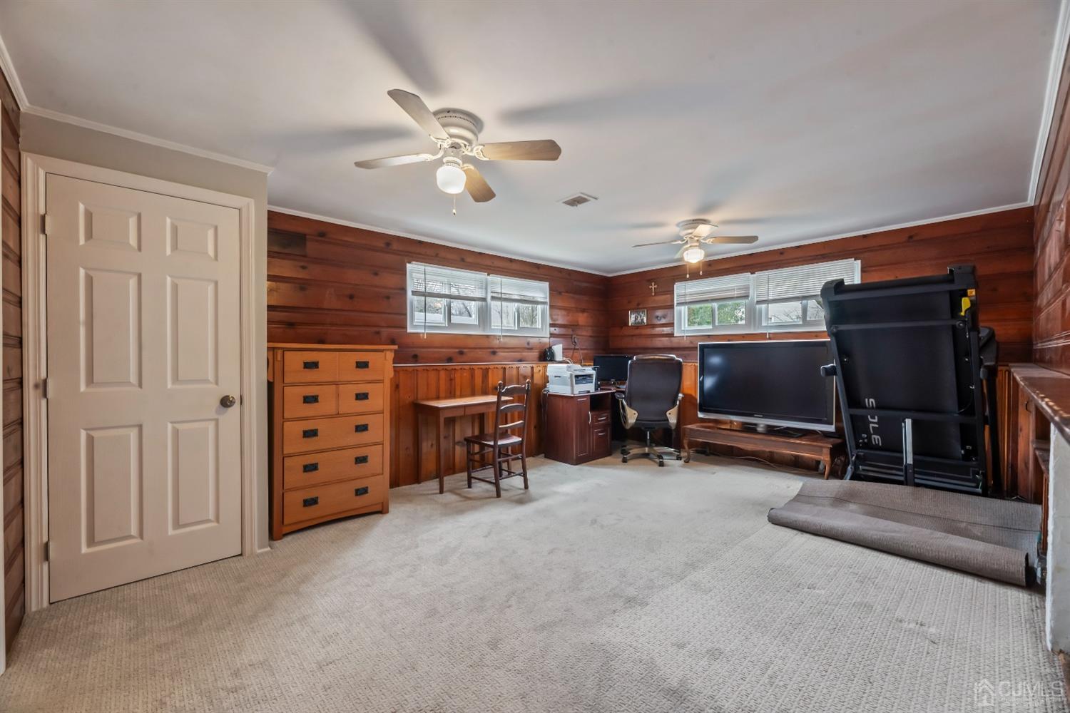36 Shetland Road East Brunswick, NJ 08816 - Photo 13 of 22 a view of a livingroom with furniture and a ceiling fan