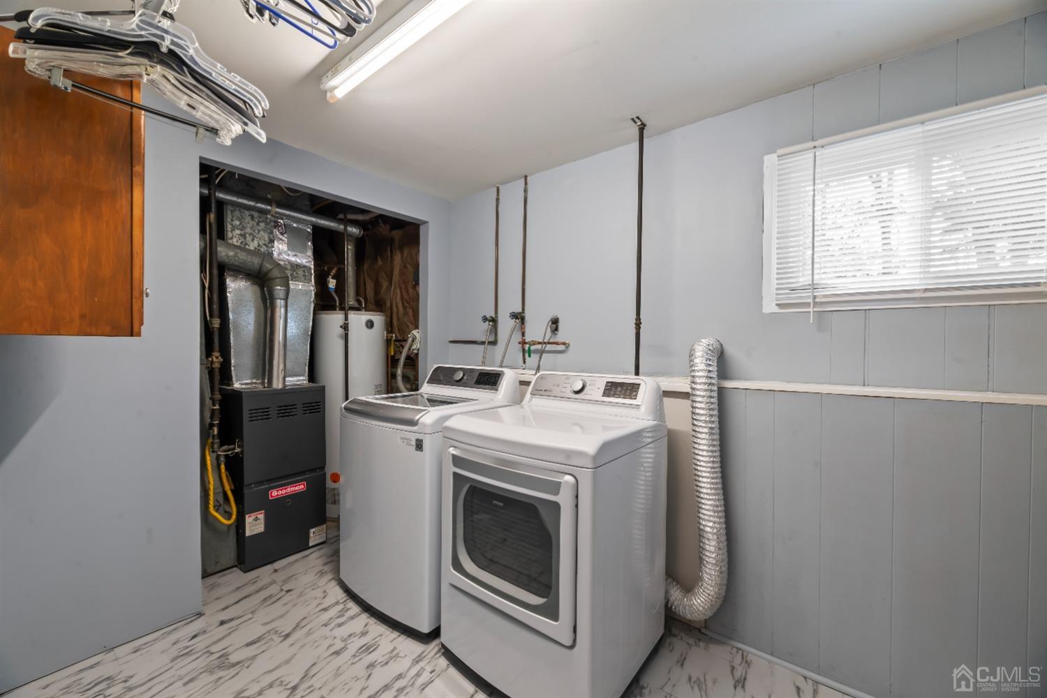 36 Shetland Road East Brunswick, NJ 08816 - Photo 14 of 22 a utility room with dryer and washer