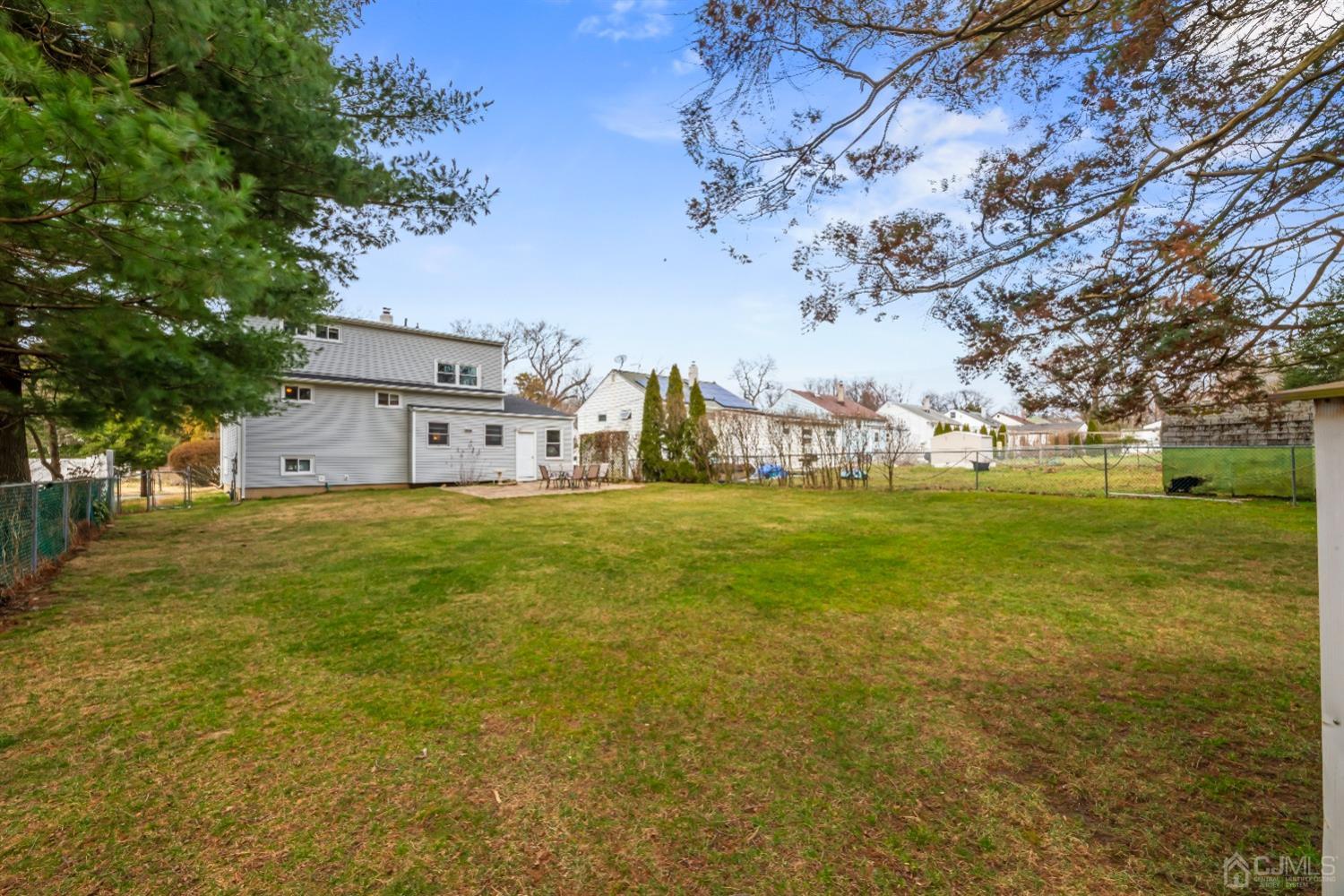 36 Shetland Road East Brunswick, NJ 08816 - Photo 17 of 22 a house view with swimming pool in front of it