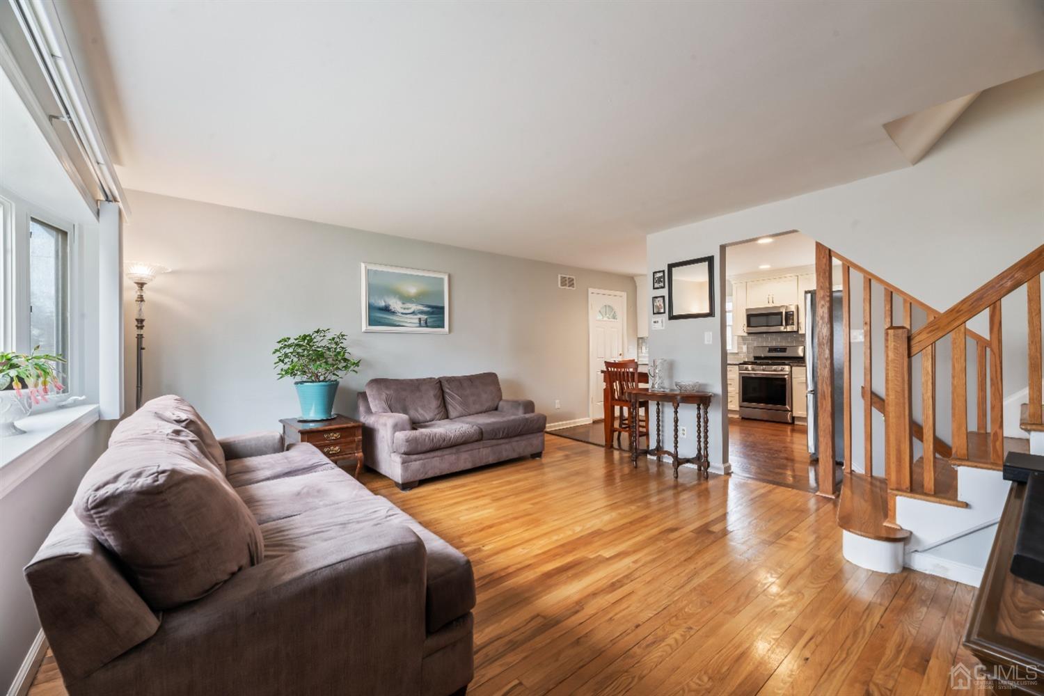 36 Shetland Road East Brunswick, NJ 08816 - Photo 2 of 22 a living room with furniture and a wooden floor