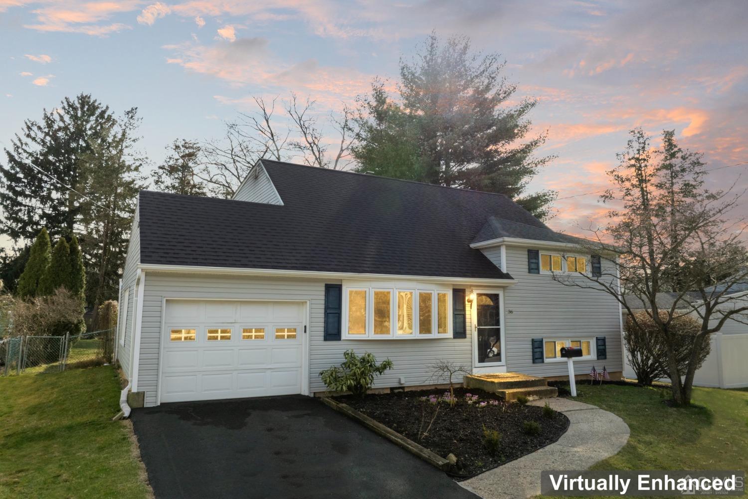 36 Shetland Road East Brunswick, NJ 08816 - Photo 21 of 22 a front view of a house with a garden