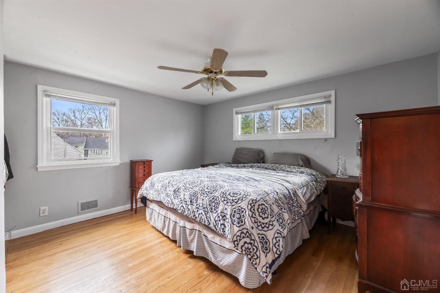 36 Shetland Road East Brunswick, NJ 08816 - Photo 6 of 22 a bedroom with a bed dresser and a window