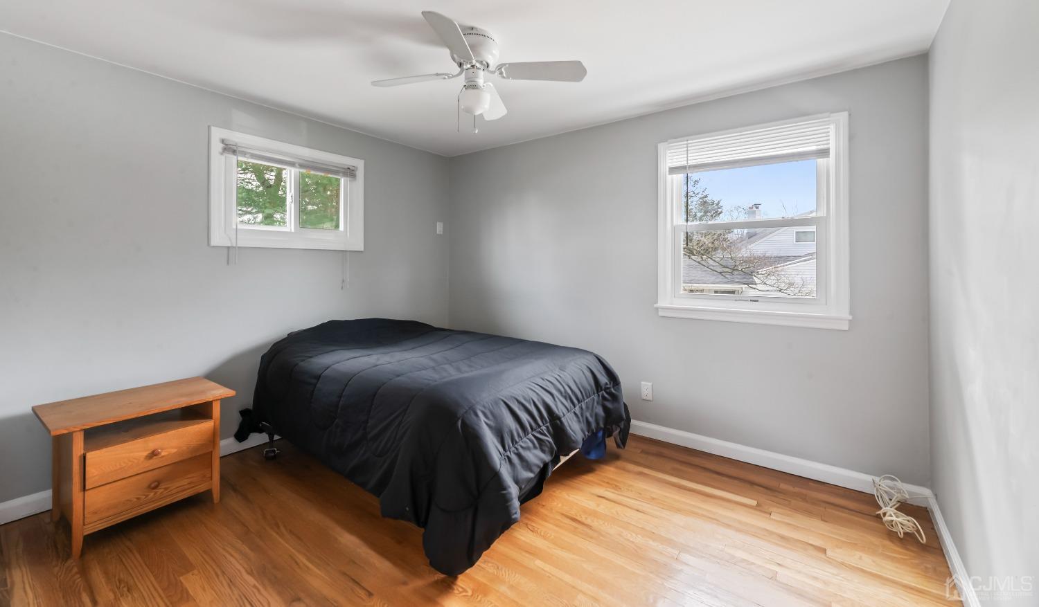36 Shetland Road East Brunswick, NJ 08816 - Photo 9 of 22 a bedroom with a bed and a window