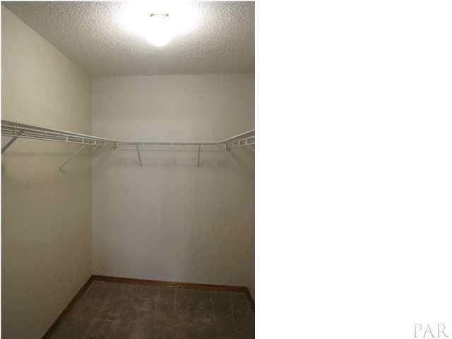 5736 Ridgefield Court Milton, FL 32583 - Photo 14 of 25 Walk-in Closet in Master