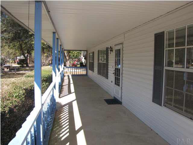 5736 Ridgefield Court Milton, FL 32583 - Photo 2 of 25 55-Foot Front Porch