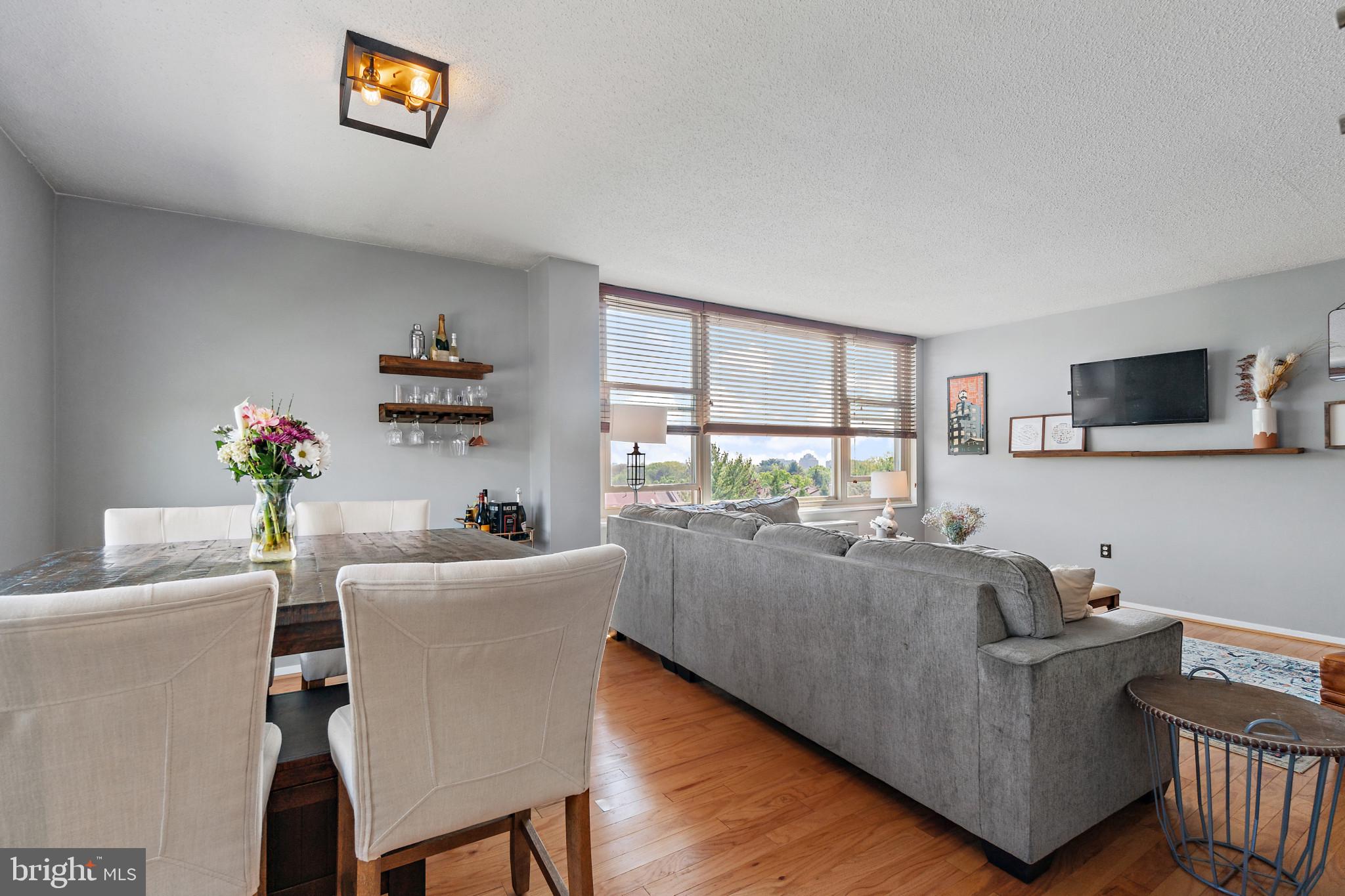 4401 Roland Avenue, Unit 507 Baltimore, MD 21210 - Photo 5 of 26 Bright, open living and dining areas