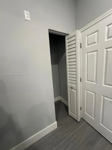 wooden floor and chair in a room