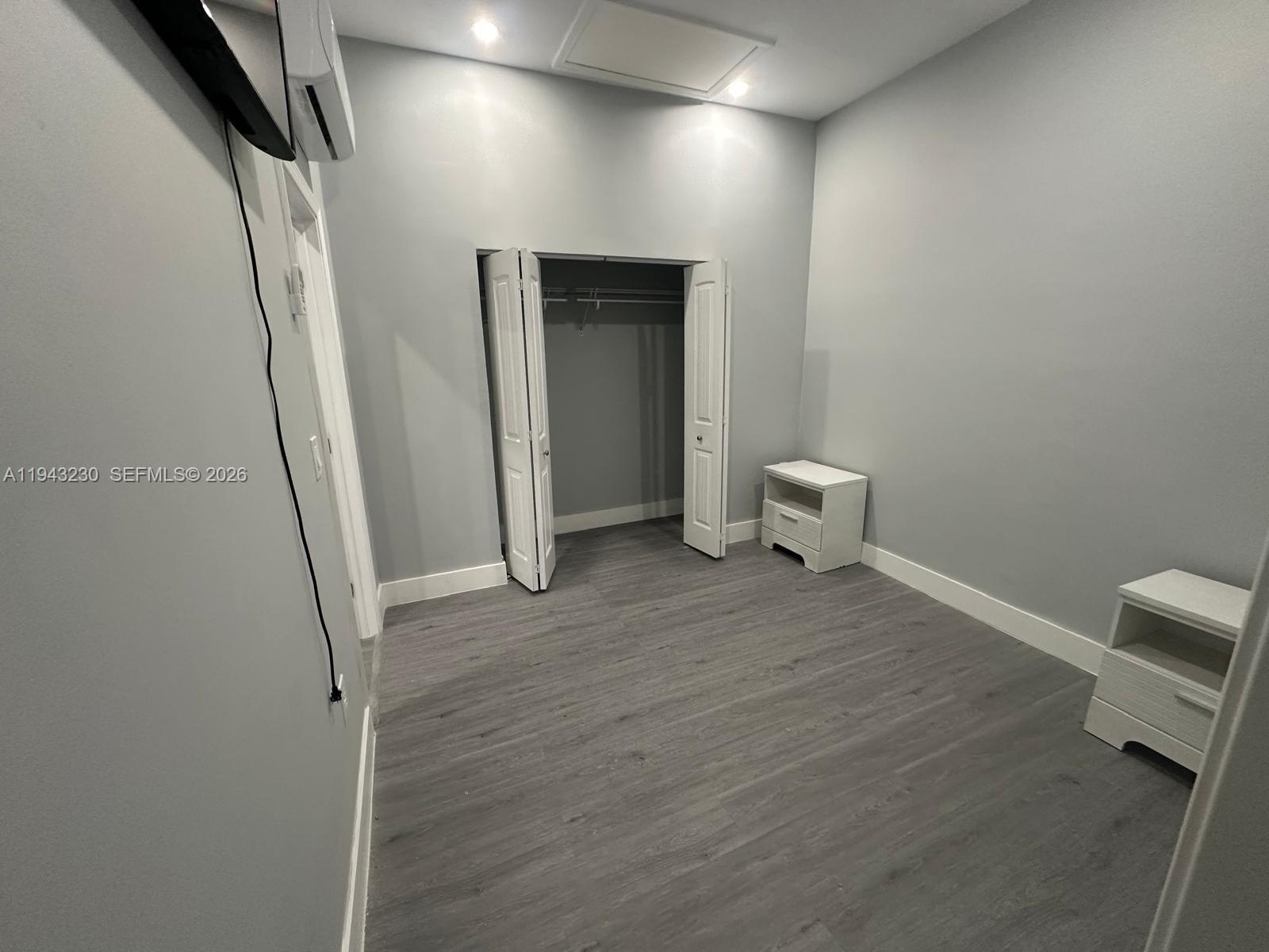 11879 Southwest 253rd Terrace Homestead, FL 33032 - Photo 7 of 15 a very nice looking room with wooden floor and a sink