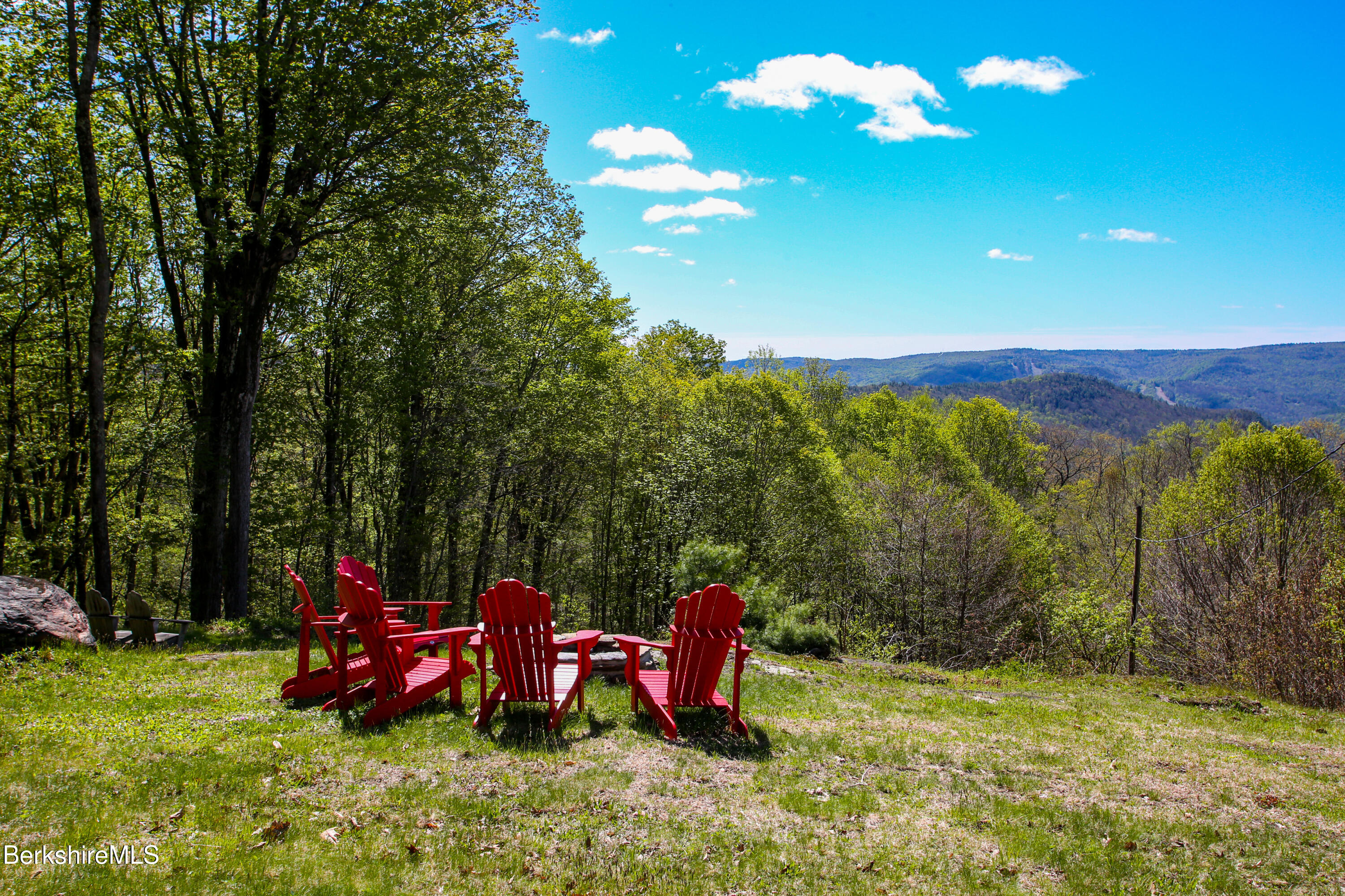 421 Legate Hill Road Charlemont, MA 01339 - Photo 33 of 37 a view of a chairs in a backyard