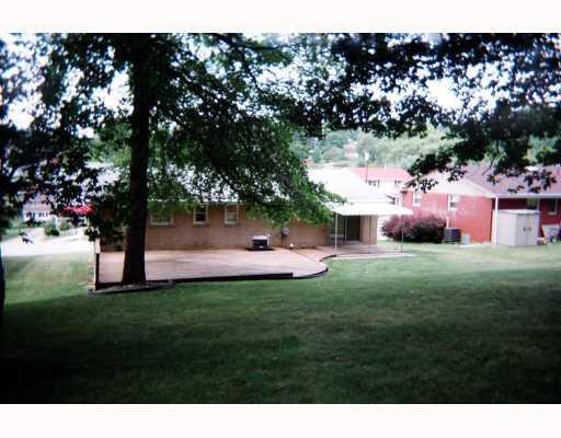 11496 Drop Road North Huntingdon, PA 15642 - Photo 2 of 7 Exterior Back. COVERD REAR PATIO AND DECK OFF DININGROOM