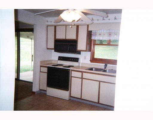 11496 Drop Road North Huntingdon, PA 15642 - Photo 5 of 7 Kitchen. WOOD CABINETS WITH VINYL FLOOR.. GAS STOVE, REFRIGERATOR AND DISHWASHER STAYS
