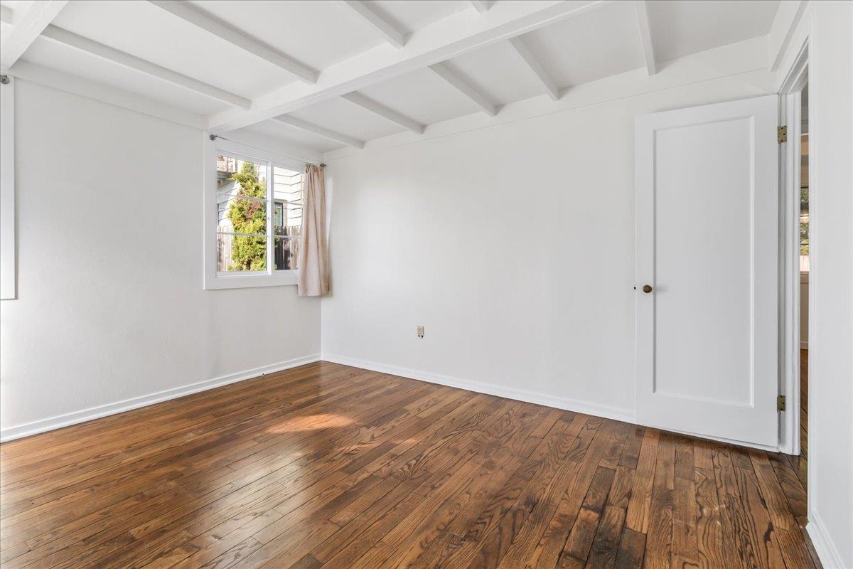24747 Valley Way Carmel, CA 93923 - Photo 16 of 24 an empty room with window and wooden floor