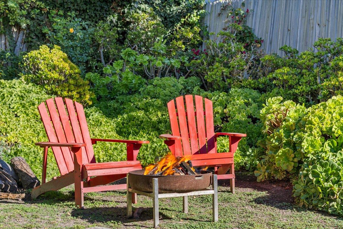 24747 Valley Way Carmel, CA 93923 - Photo 21 of 24 a backyard of a house with outdoor seating
