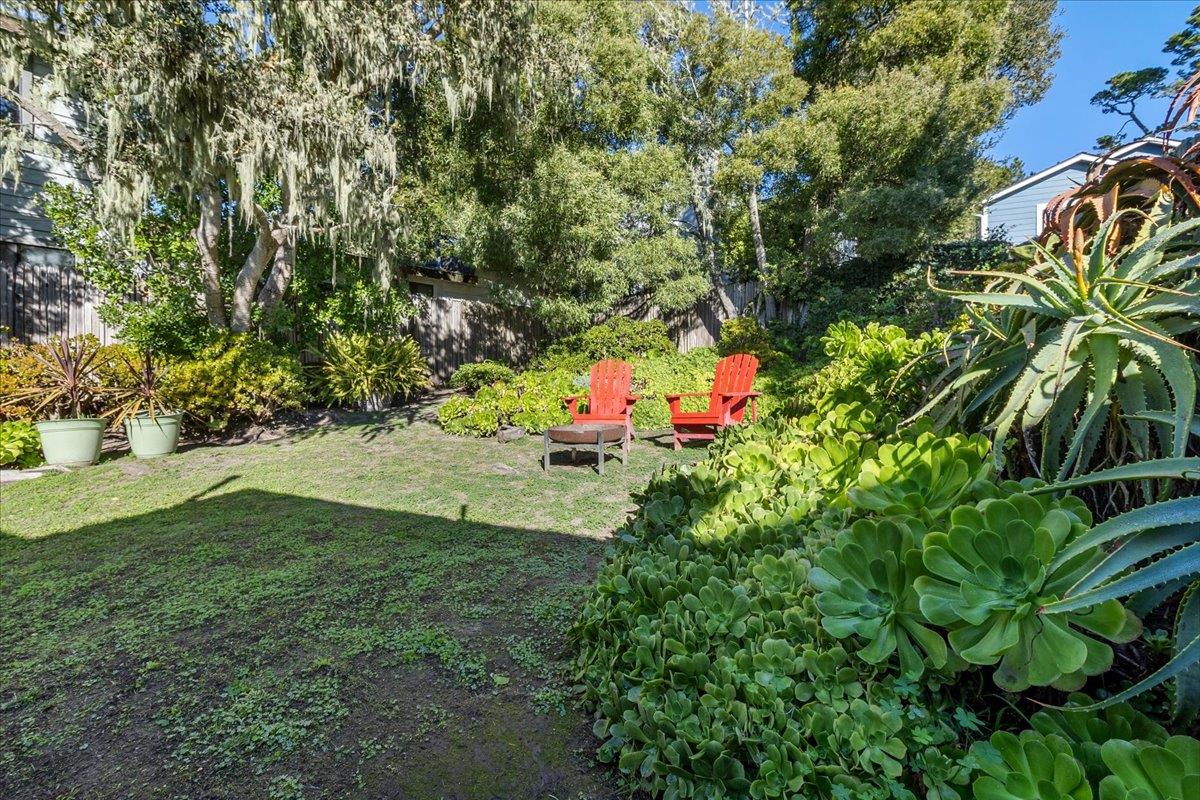 24747 Valley Way Carmel, CA 93923 - Photo 22 of 24 a backyard of a house with lots of green space