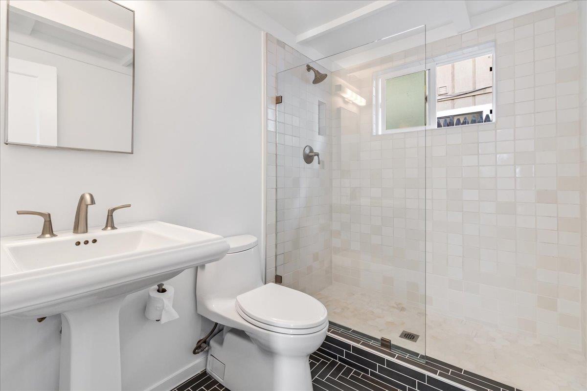 24747 Valley Way Carmel, CA 93923 - Photo 4 of 24 a bathroom with a sink toilet and shower