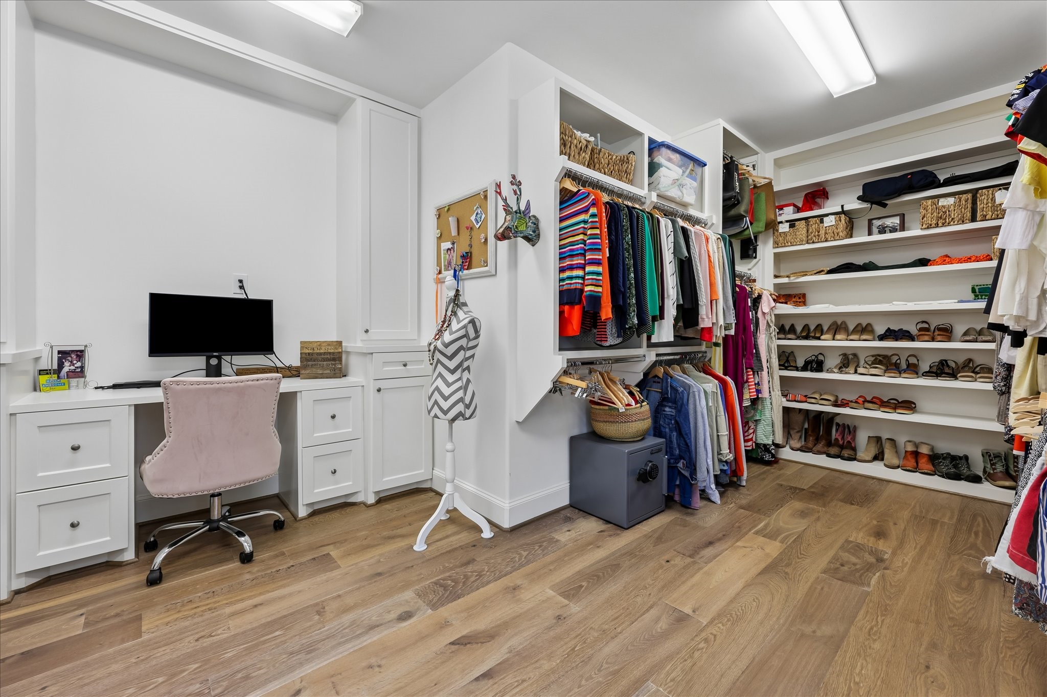 3020 Lake Street Houston, TX 77098 - Photo 29 of 43 A large walk-in closet with desk-makeup area is located thru the primary bath. The second closet is accessed from the bedroom.