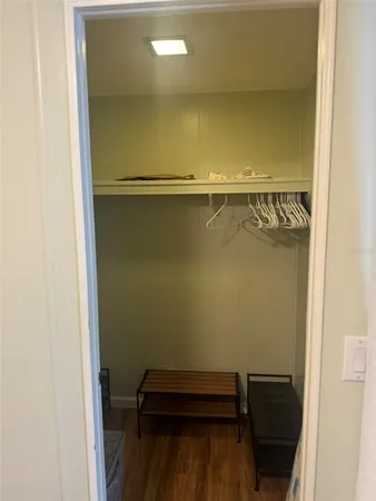 view of a room with wooden floor