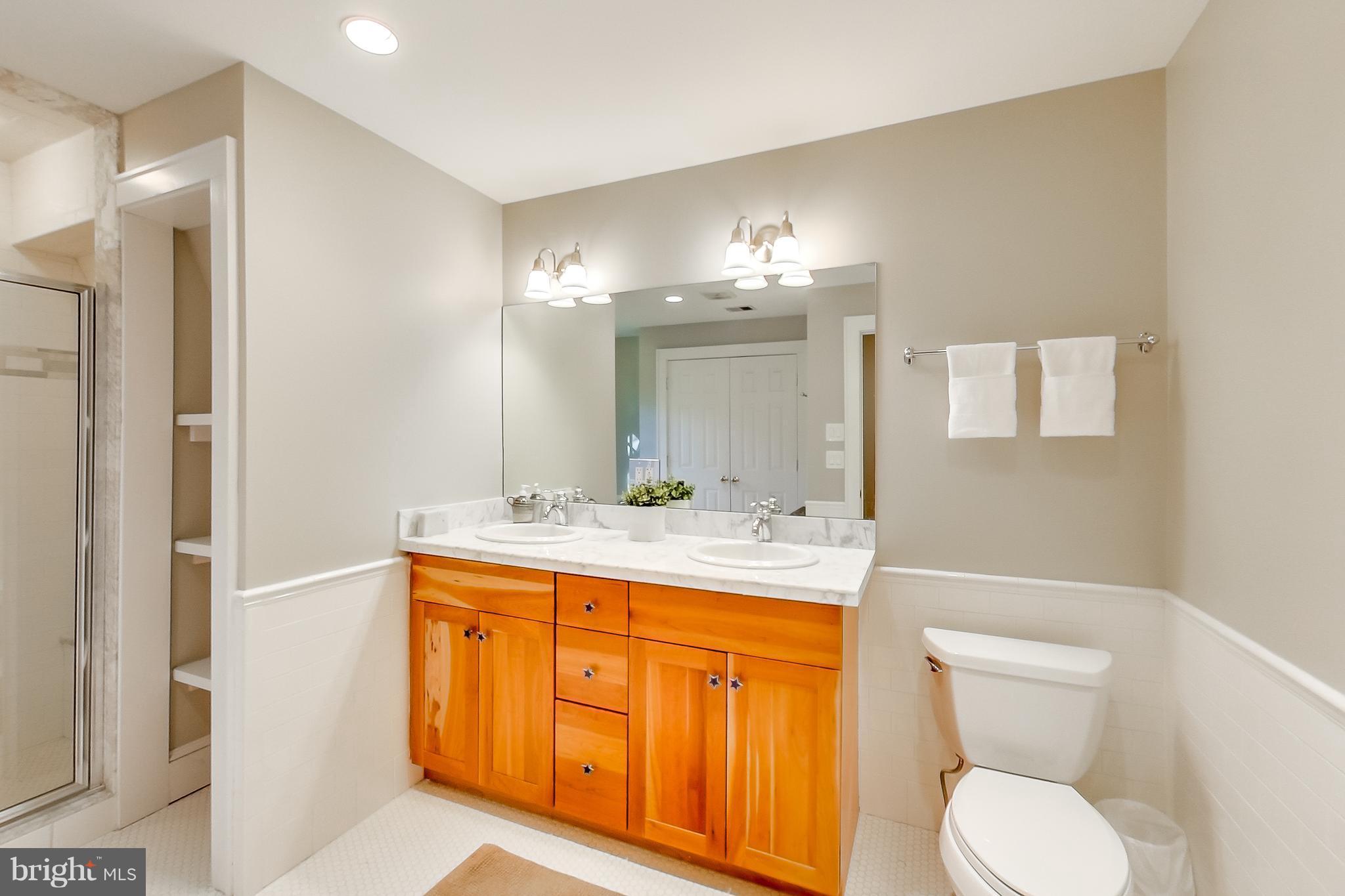 7412 Ridgewood Avenue Chevy Chase, MD 20815 - Photo 16 of 30 Updated Full Bathroom